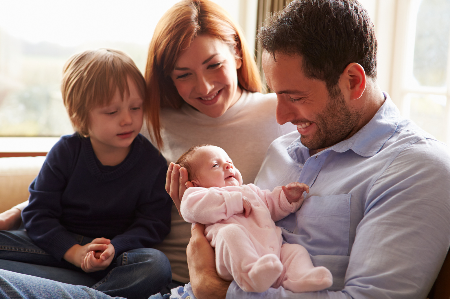 Family with Newborn Baby