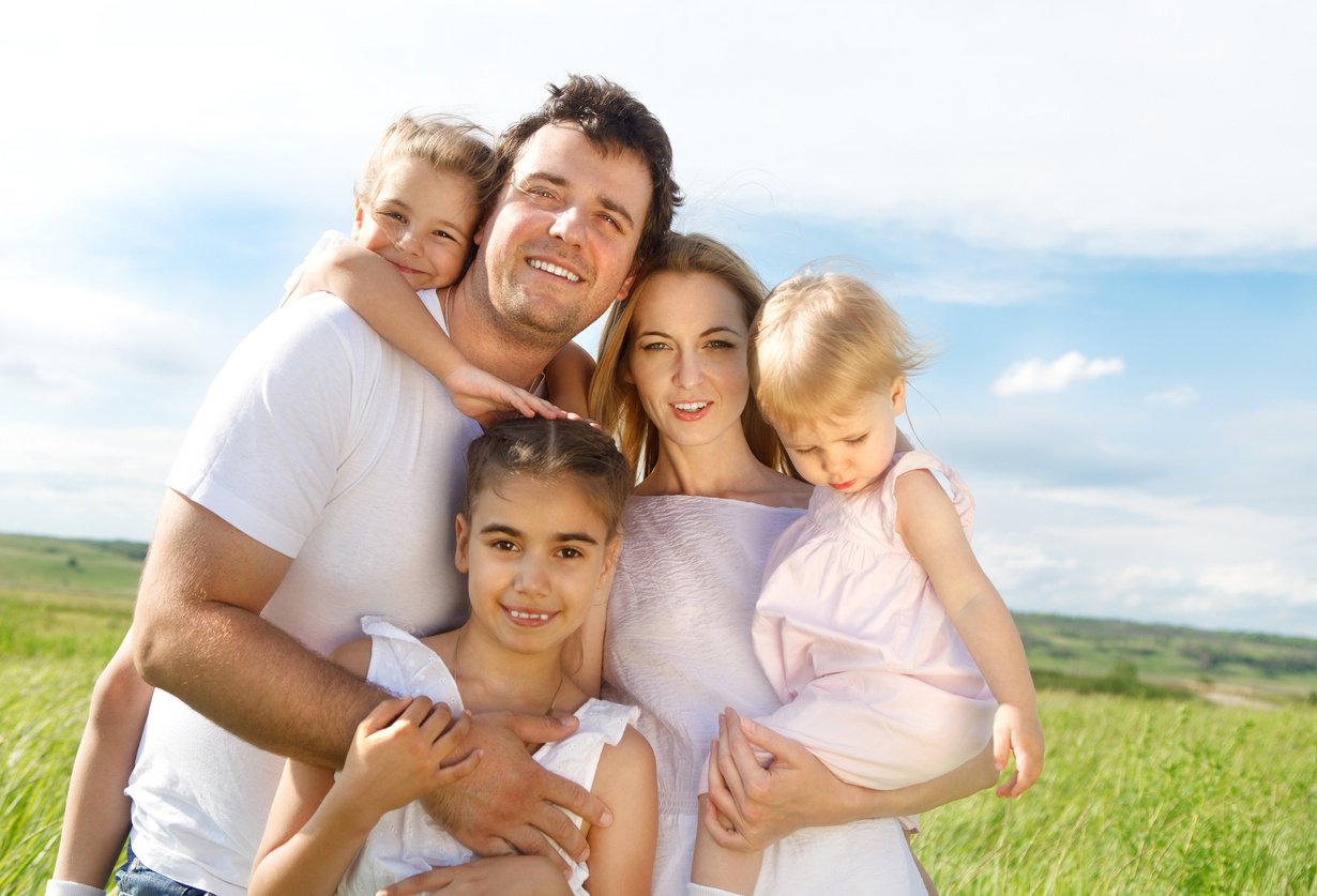 Happy young family with three children